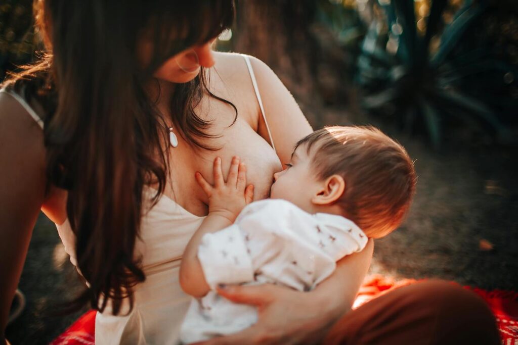 A person breastfeeding her baby.