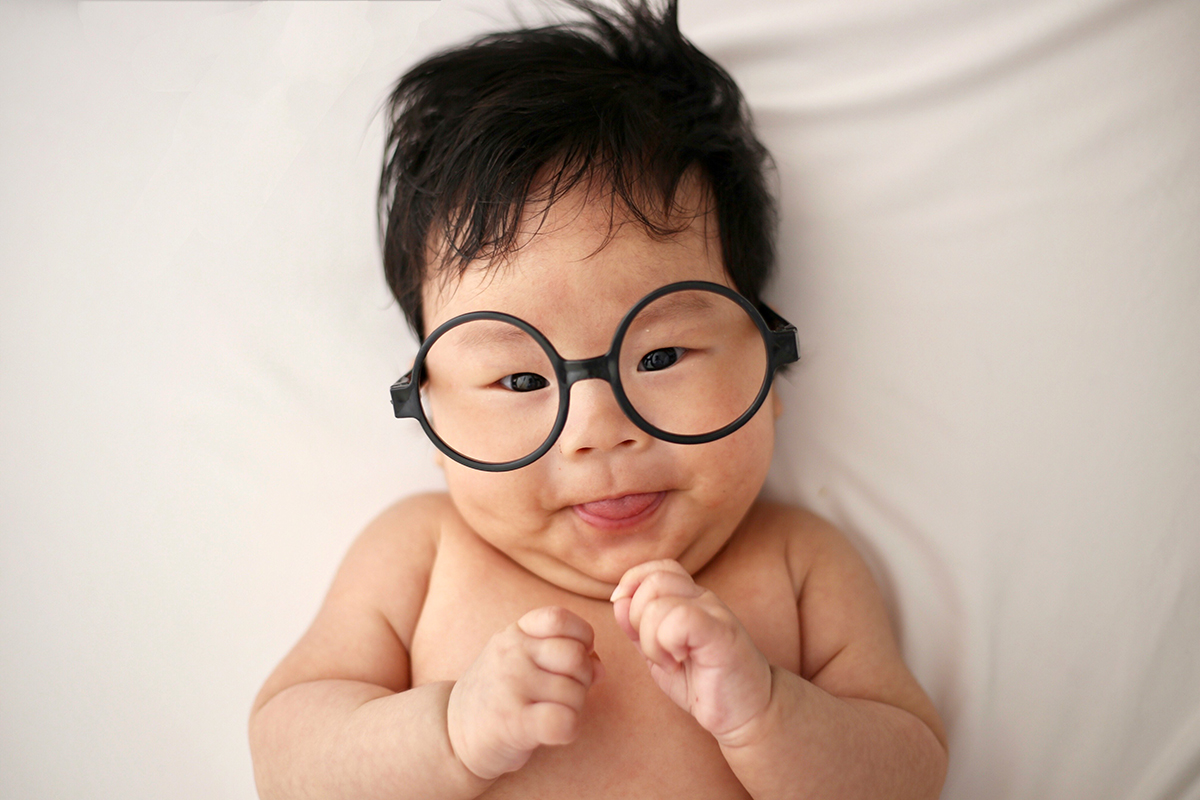 a baby wearing a big glasses