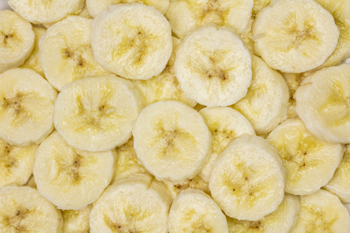 Sliced bananas are arranged in a pile.