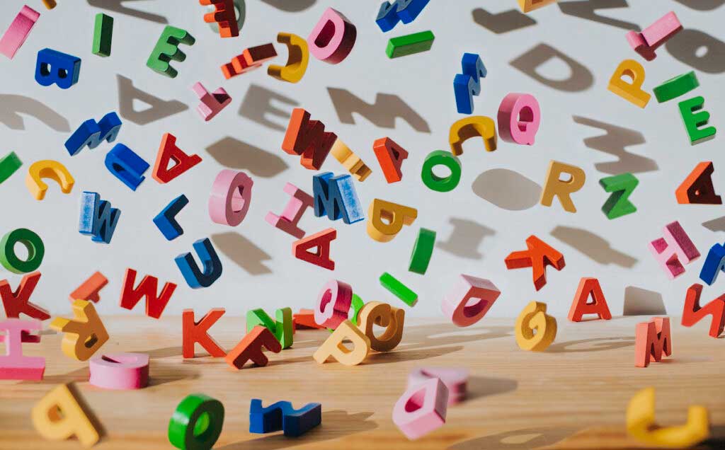 Colorful falling plastic letters.