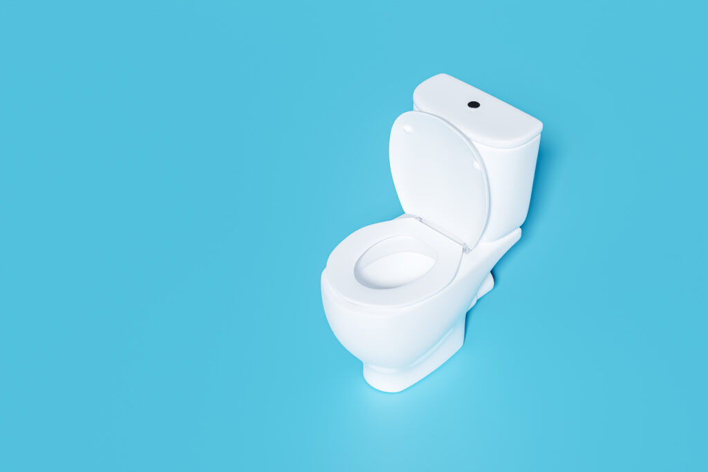 A white toilet seen from above on a blue background.