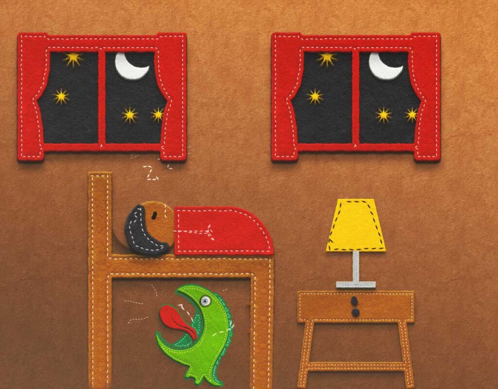 A felt illustration of a child in bed with a green monster under the bed.