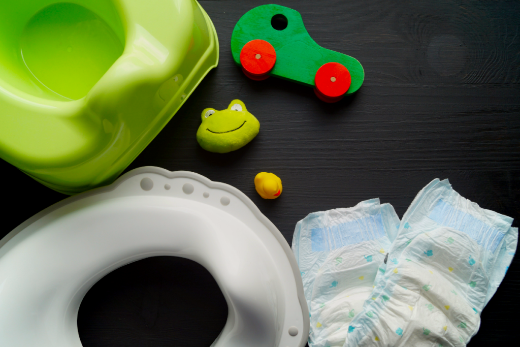 A potty seat, toys and diapers