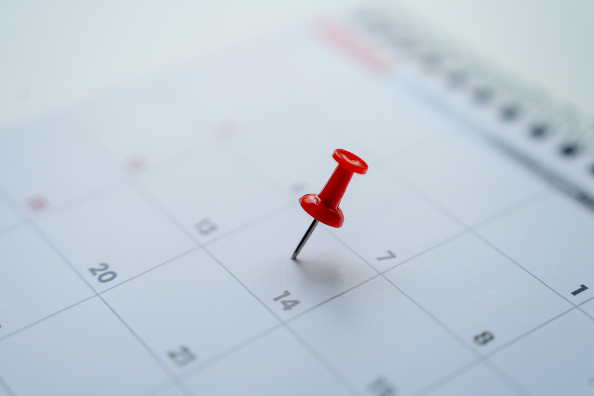 An image of a pin in a calendar marking the day to try to conceive.