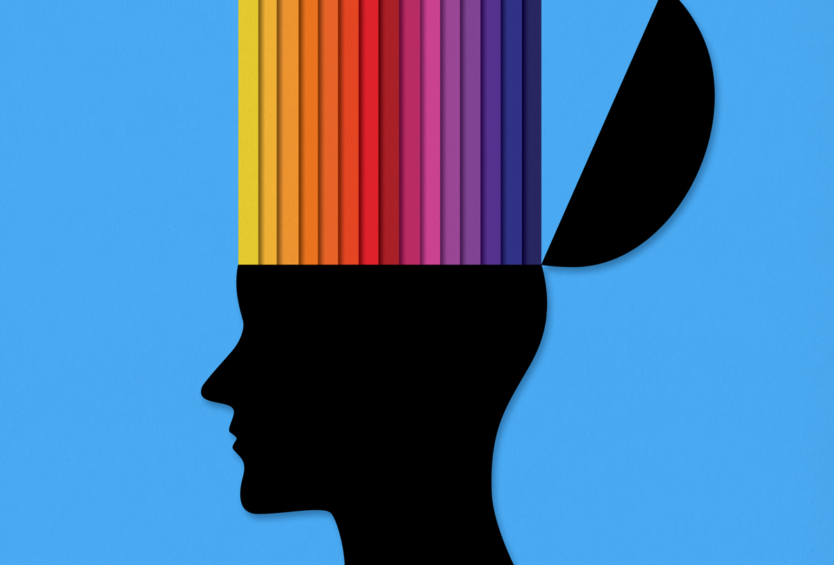 An illustration of a head, with the top opening up to reveal a rainbow of colors against a blue background.