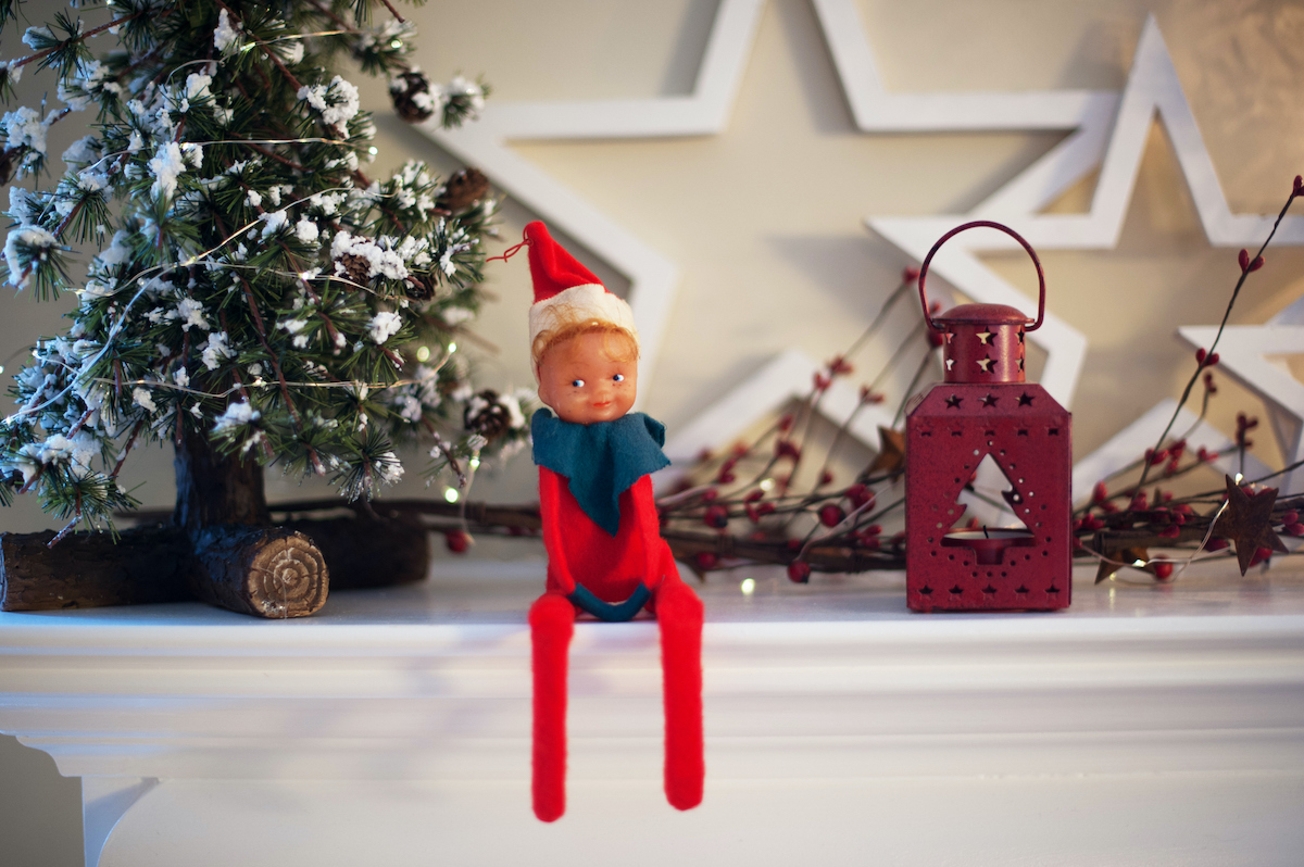 Elf on the shelf with other holiday decorations