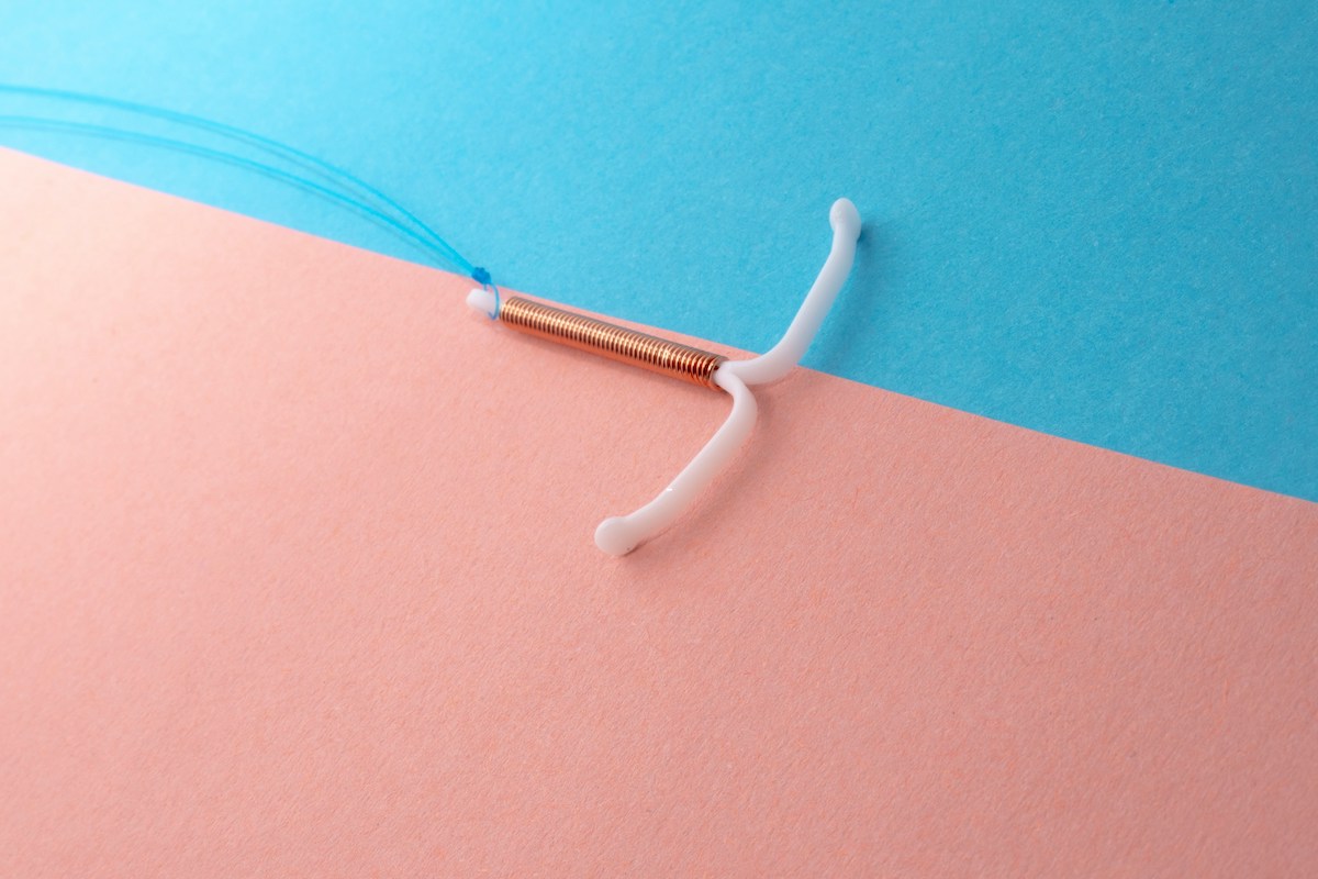 IUD on colored background