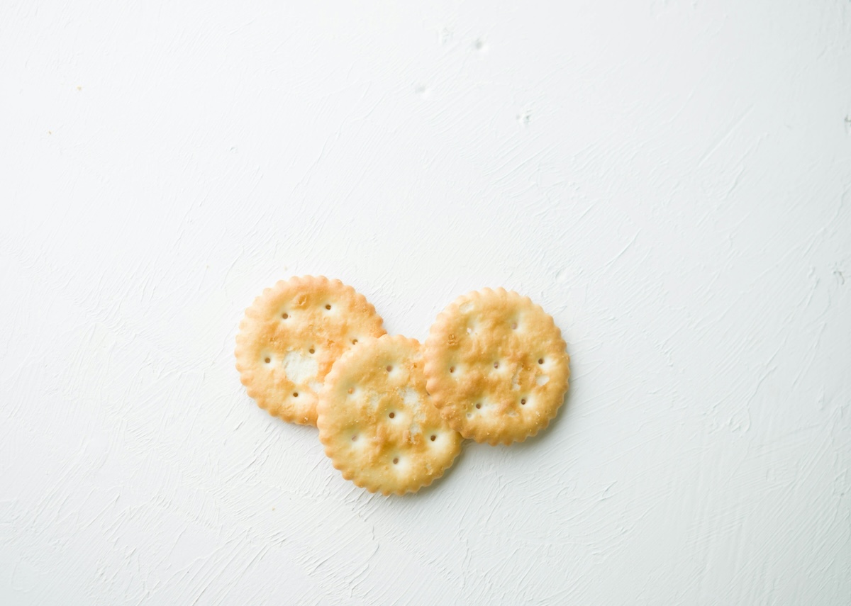 Three crackers on a white background