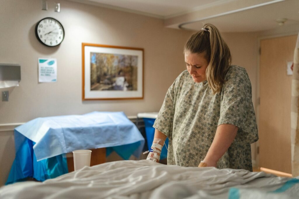 Person in labor in hospital room