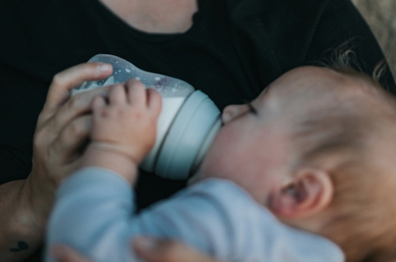 child taking milk