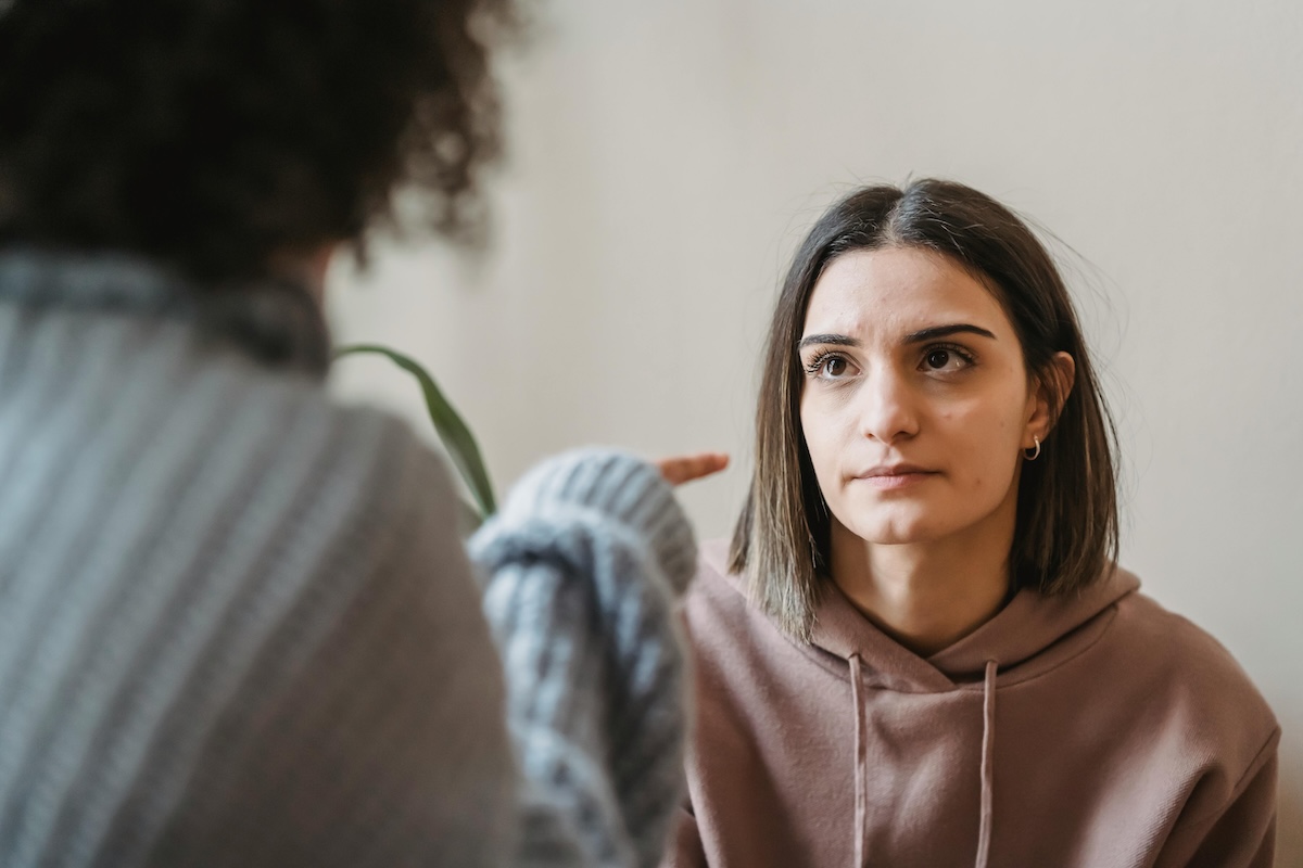 Person looking annoyed at another person