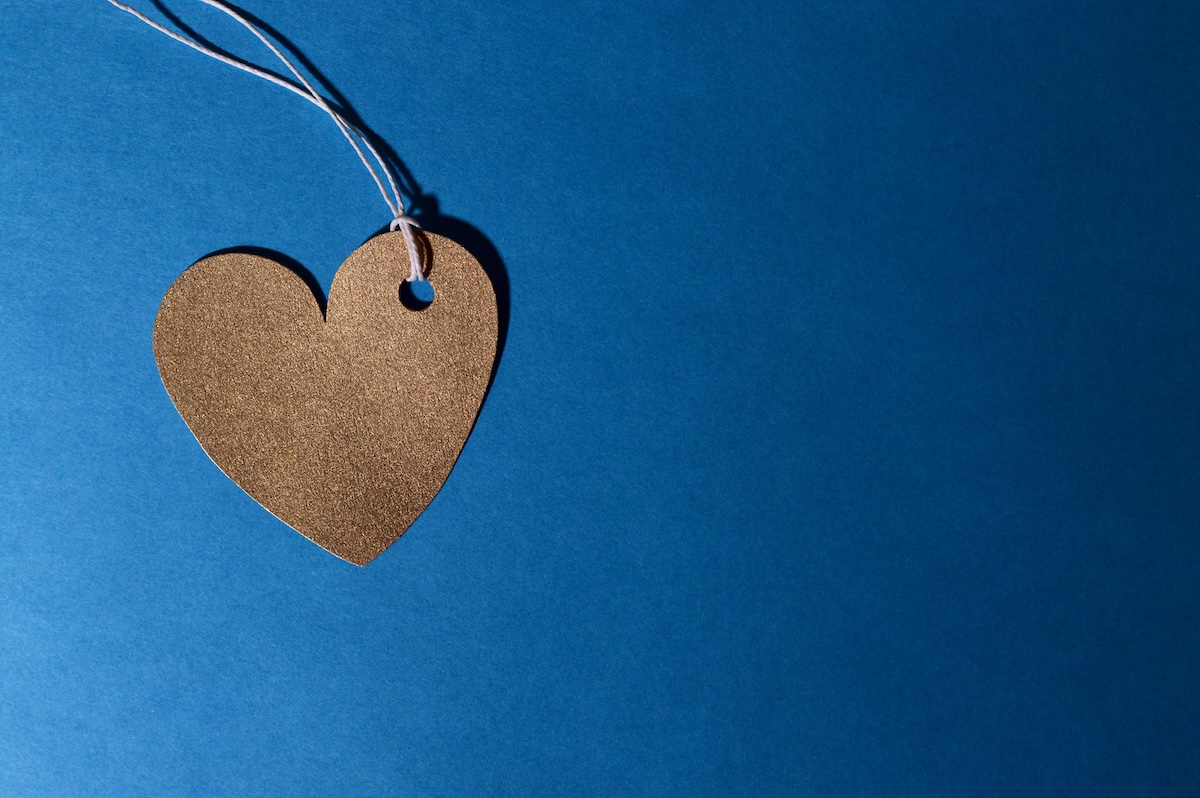 a heart locket with a blue background