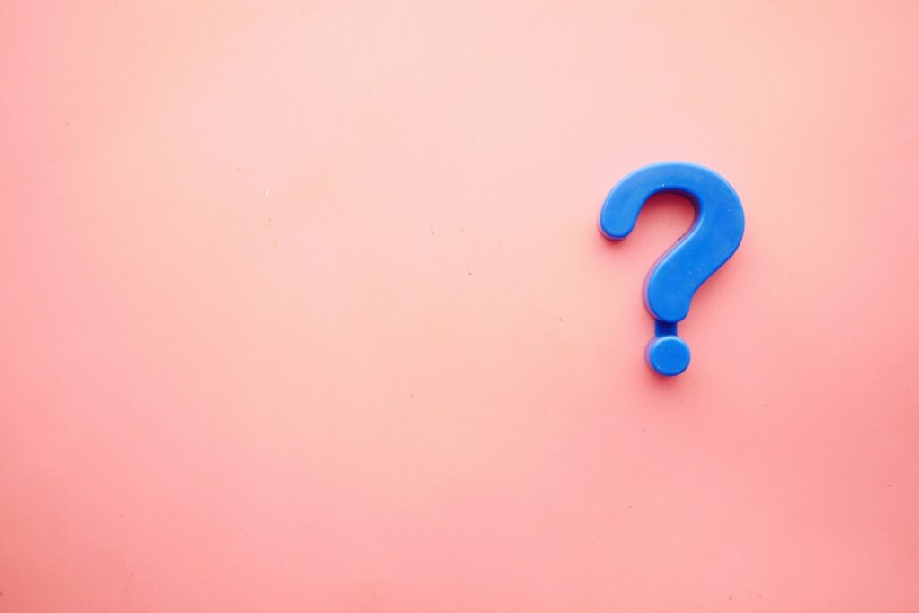 blue question mark with pink background