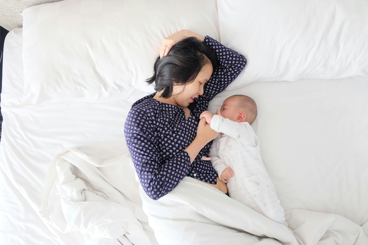 parent and a child sleeping together