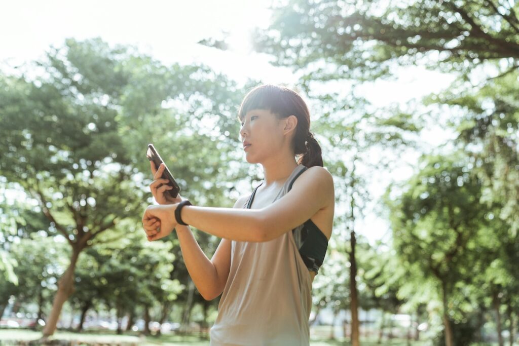 an adult watching the health activity on smart watch