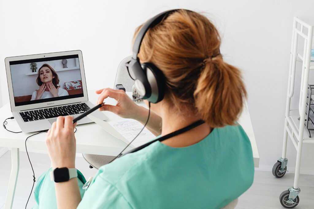 doctor talking to a patient on a remote call