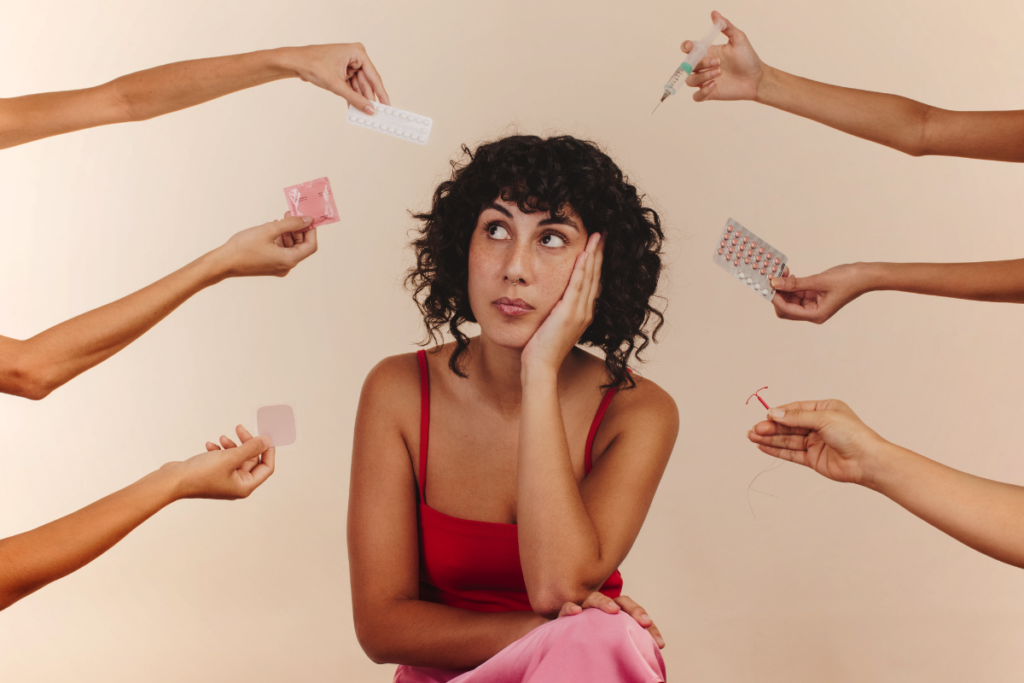 adult sitting with different hands giving medicine