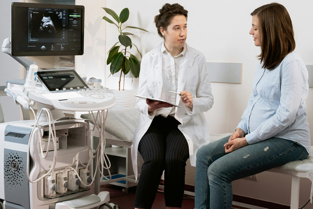 doctor discussing report with patient in the clinic