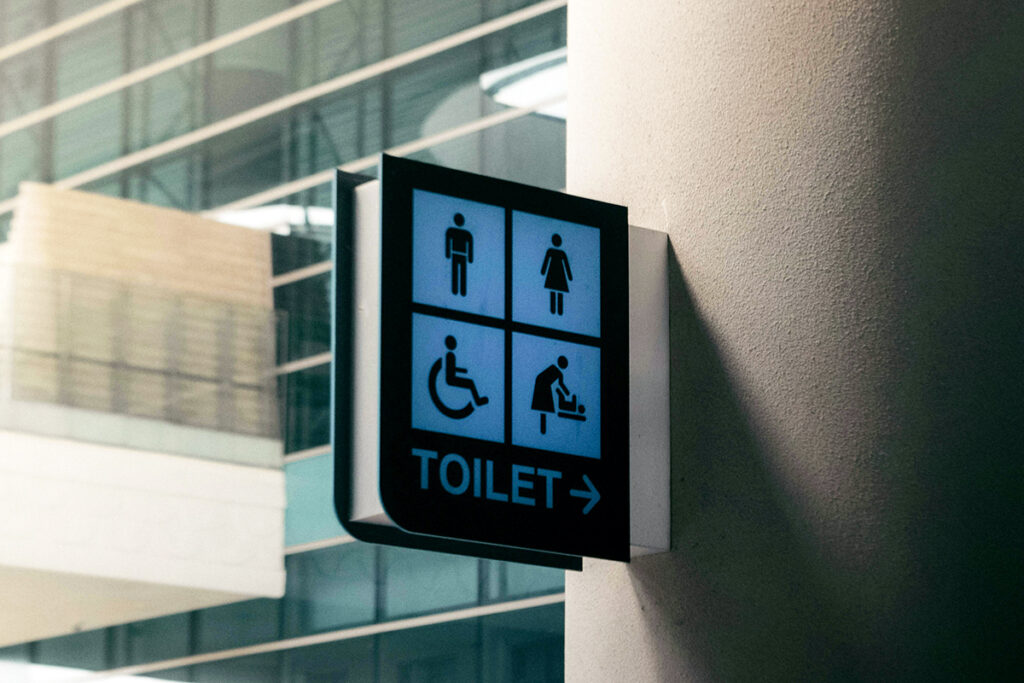 toilet sign board with men women, baby change and wheelchair symbols