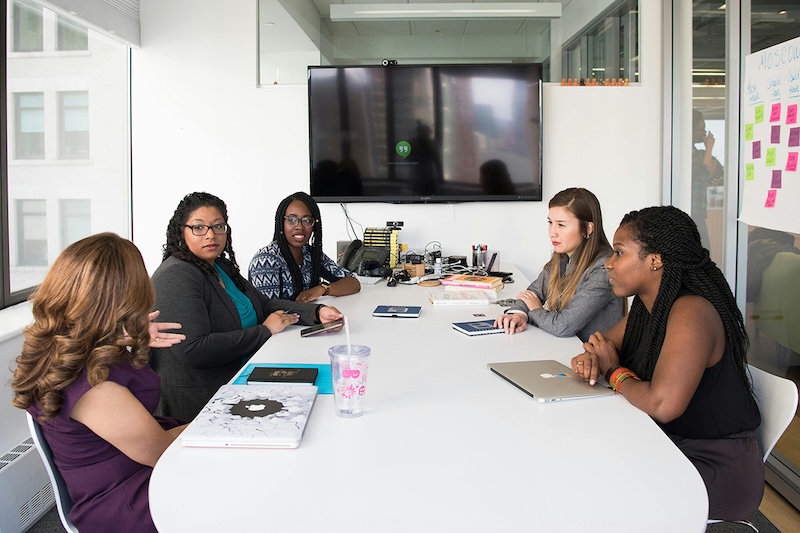 Women sitting around a conference table