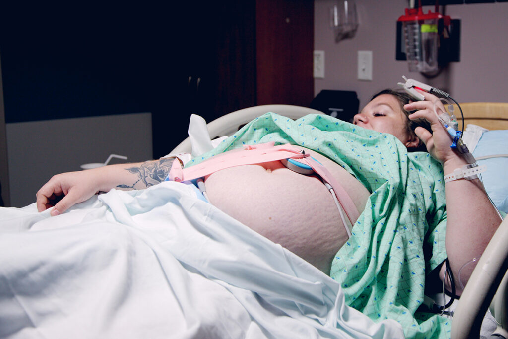 A pregnant person in delivery room