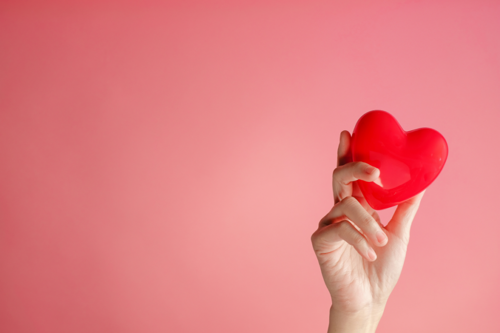 Hands holding a heart shape