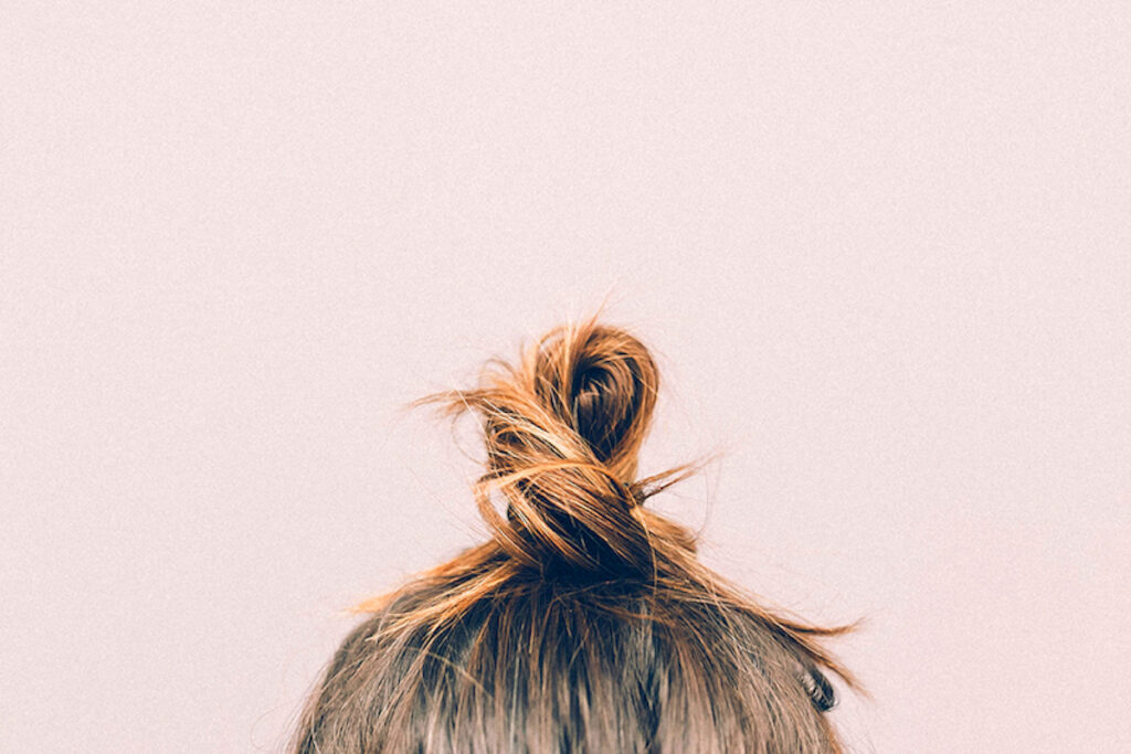 Zoom in of hair tied in a bun