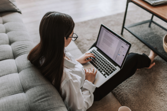 A person working on a laptop.