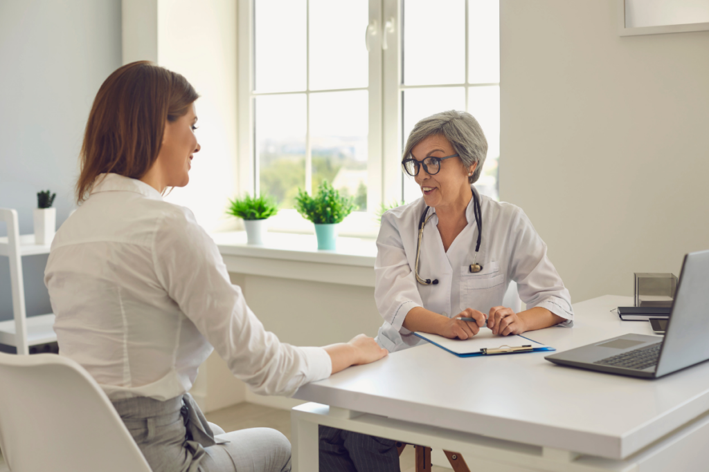 A doctor discussing with a patient.