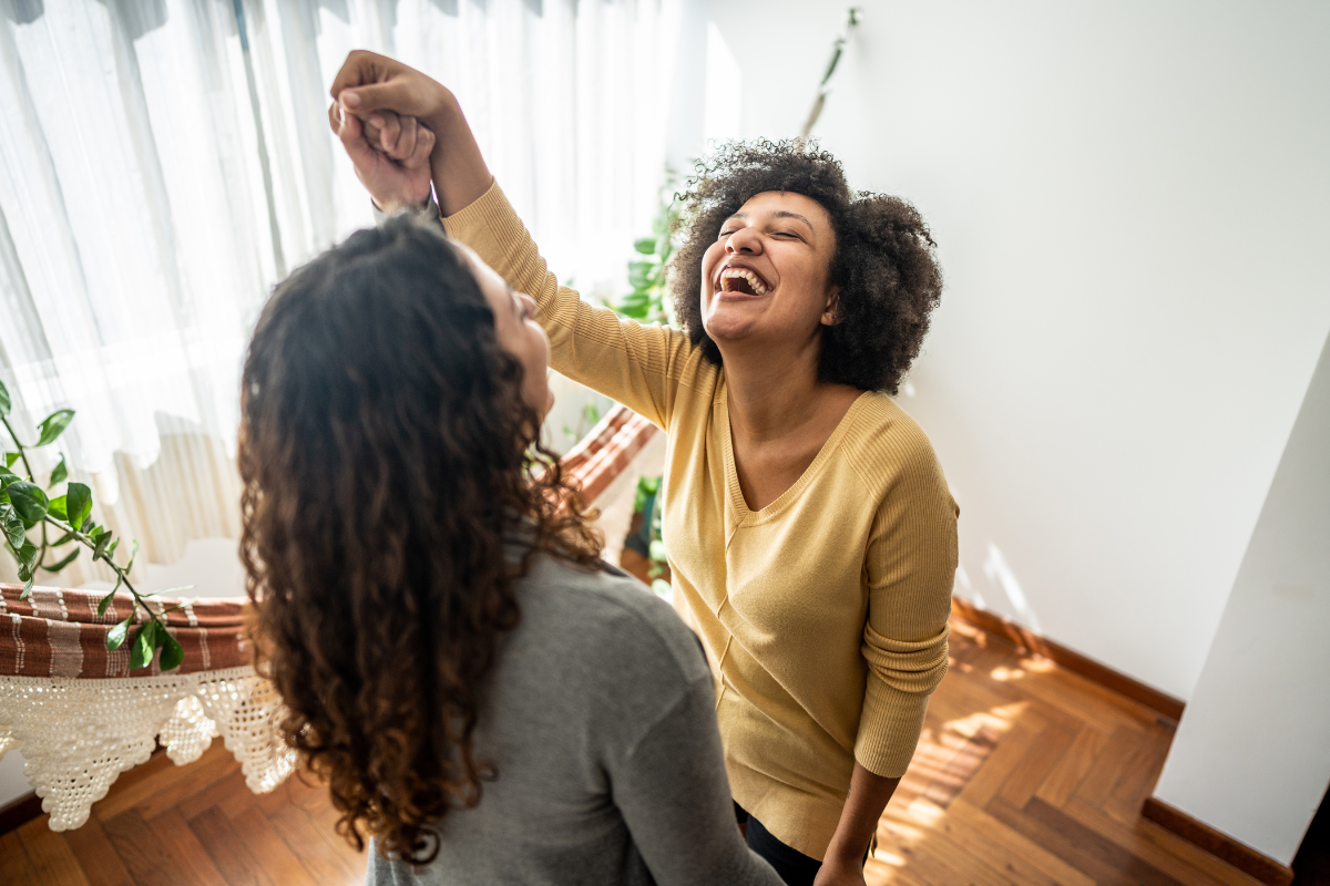 Two people dancing with each other.