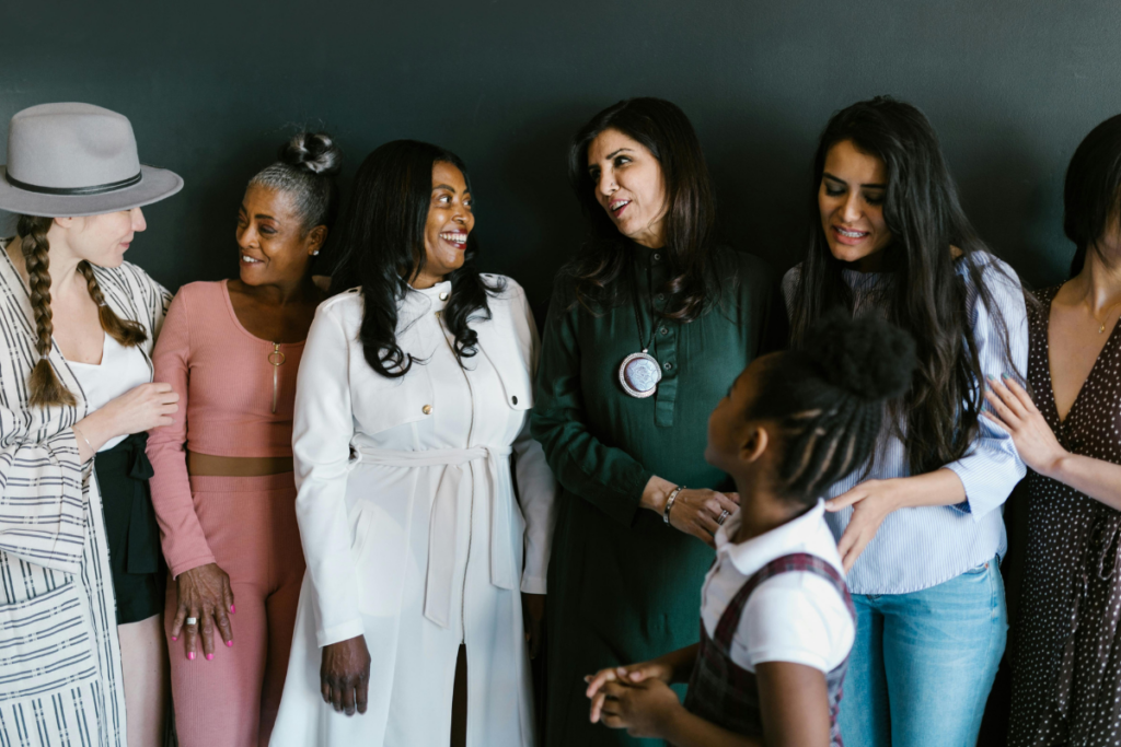 Women standing next to each other