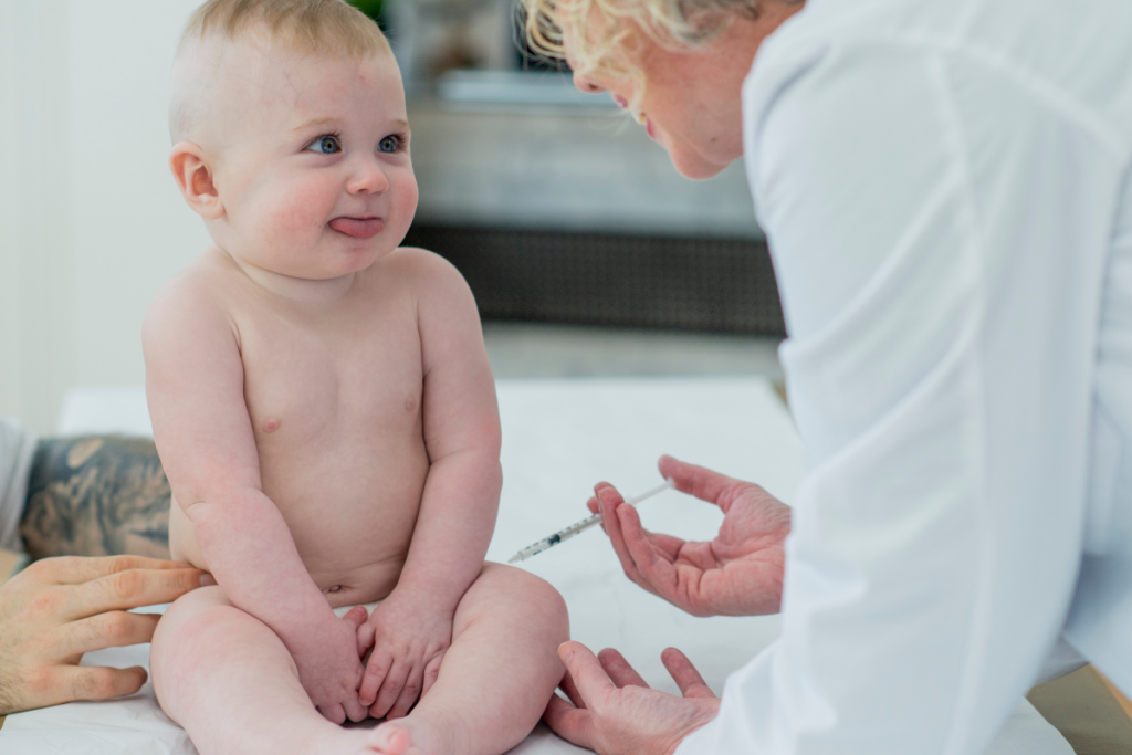 A baby getting vaccinated.