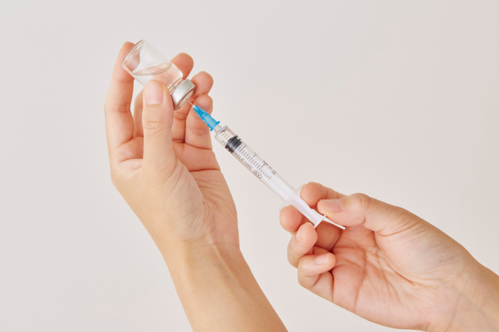 Vaccine being loaded in the syringe.