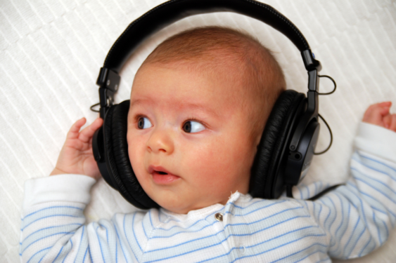A baby wearing headphones.